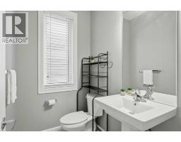 Laundry room - 733 Windrow Manor Sw, Airdrie, AB T4B5H6 Photo 13