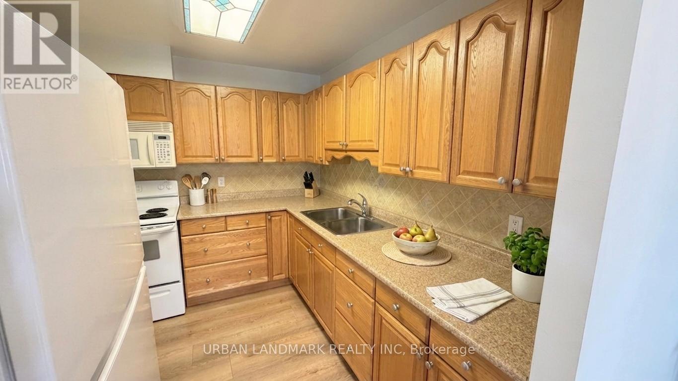 #201 131 TAUNTON ROAD E - Image 4