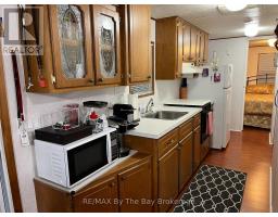 68 - 85 Theme Park Drive, Wasaga Beach, ON L9Z1X7 Photo 18