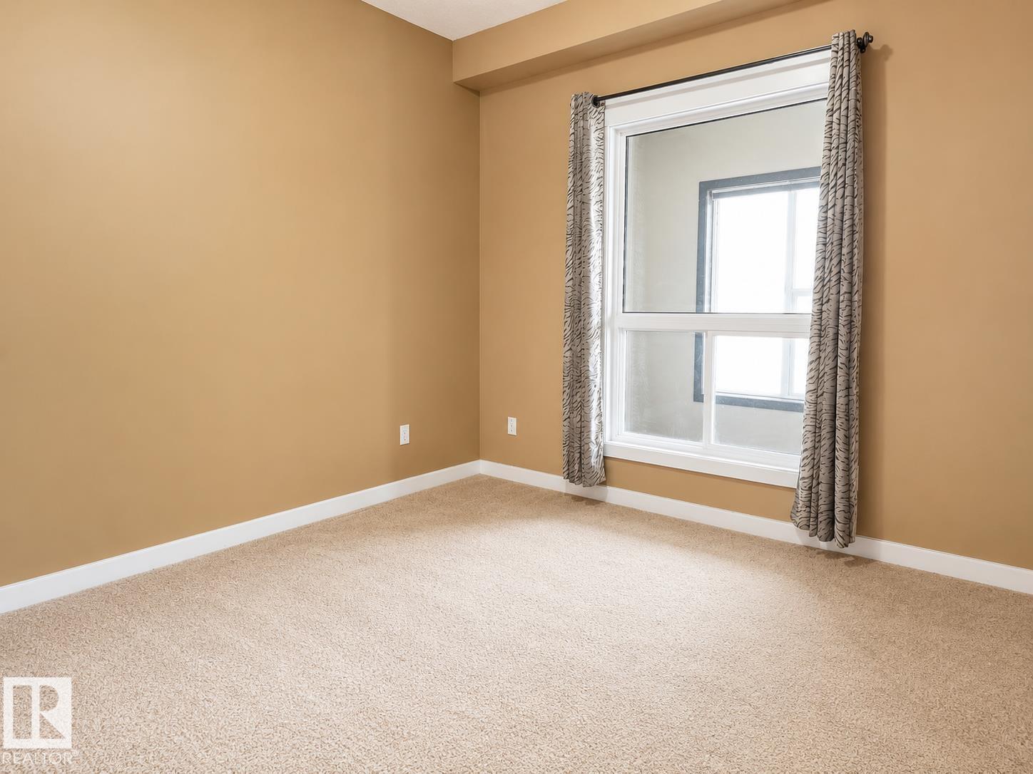 #203 10518 113 ST NW - 11