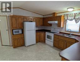 Living room - 211 Railway Avenue, Coaldale, AB T1M0A8 Photo 6