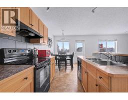 Bedroom - 102, 800 Yankee Valley Boulevard Se, Airdrie, AB T4A2L1 Photo 6