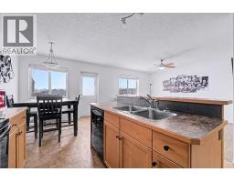 Primary Bedroom - 102, 800 Yankee Valley Boulevard Se, Airdrie, AB T4A2L1 Photo 8