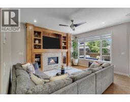 Family room - 308 Kinniburgh Link, Chestermere, AB T1X0P8 Photo 13