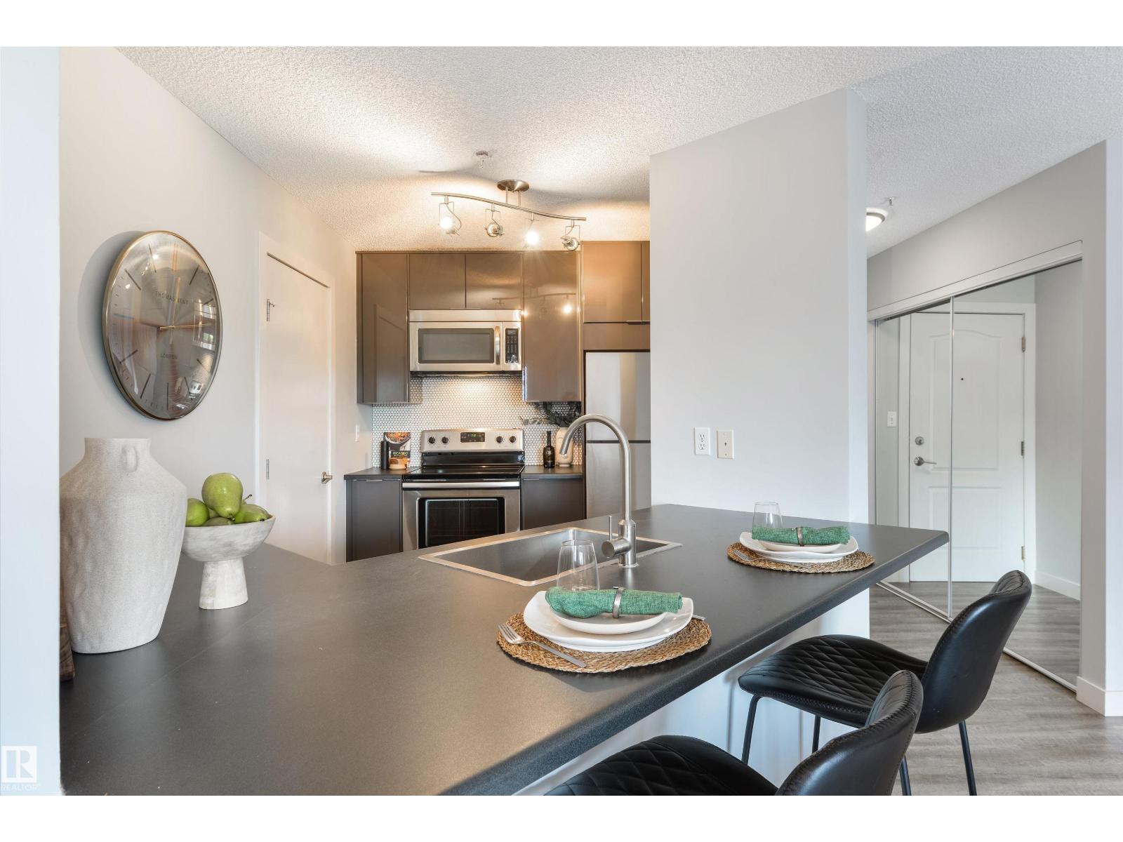 #409 10153 117 ST NW - 12