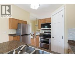 Laundry room - 110 Bennion Crescent, Saskatoon, SK S7W0H1 Photo 14