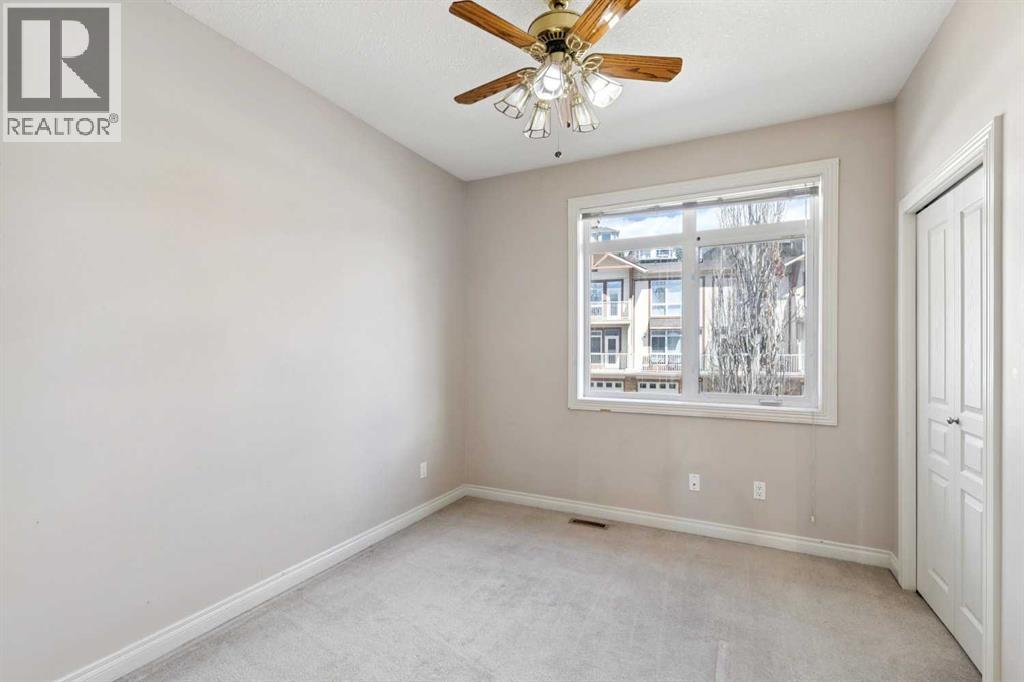 #14 169 Rockyledge View NW - 18