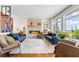 Family room - 90 Juneberry Heights, Rural Rocky View County, AB T3Z0E6 Photo 12