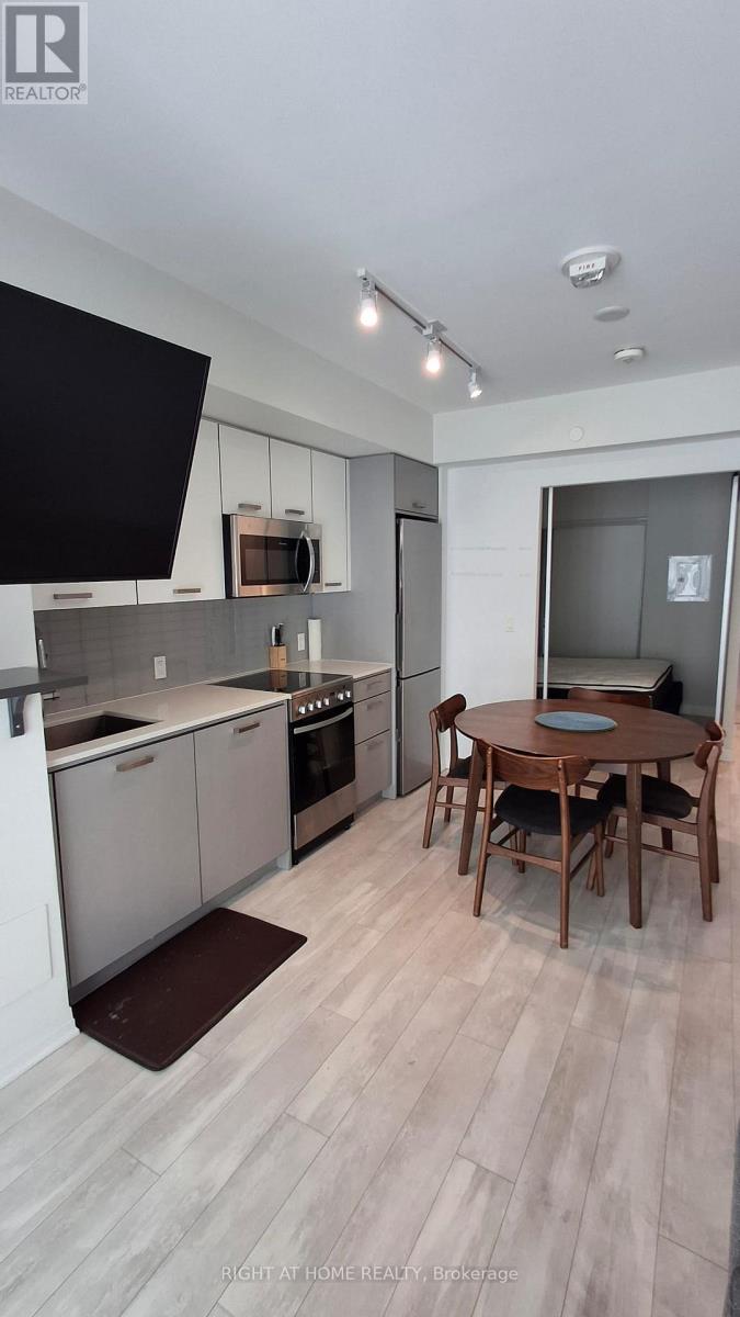 #211 1630 QUEEN STREET E - 2