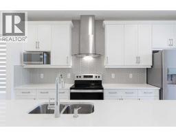 Foyer - 186 Aquila Drive Nw, Calgary, AB T3R1Y5 Photo 10