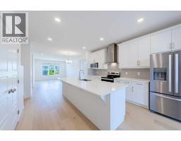Laundry room - 186 Aquila Drive Nw, Calgary, AB T3R1Y5 Photo 9