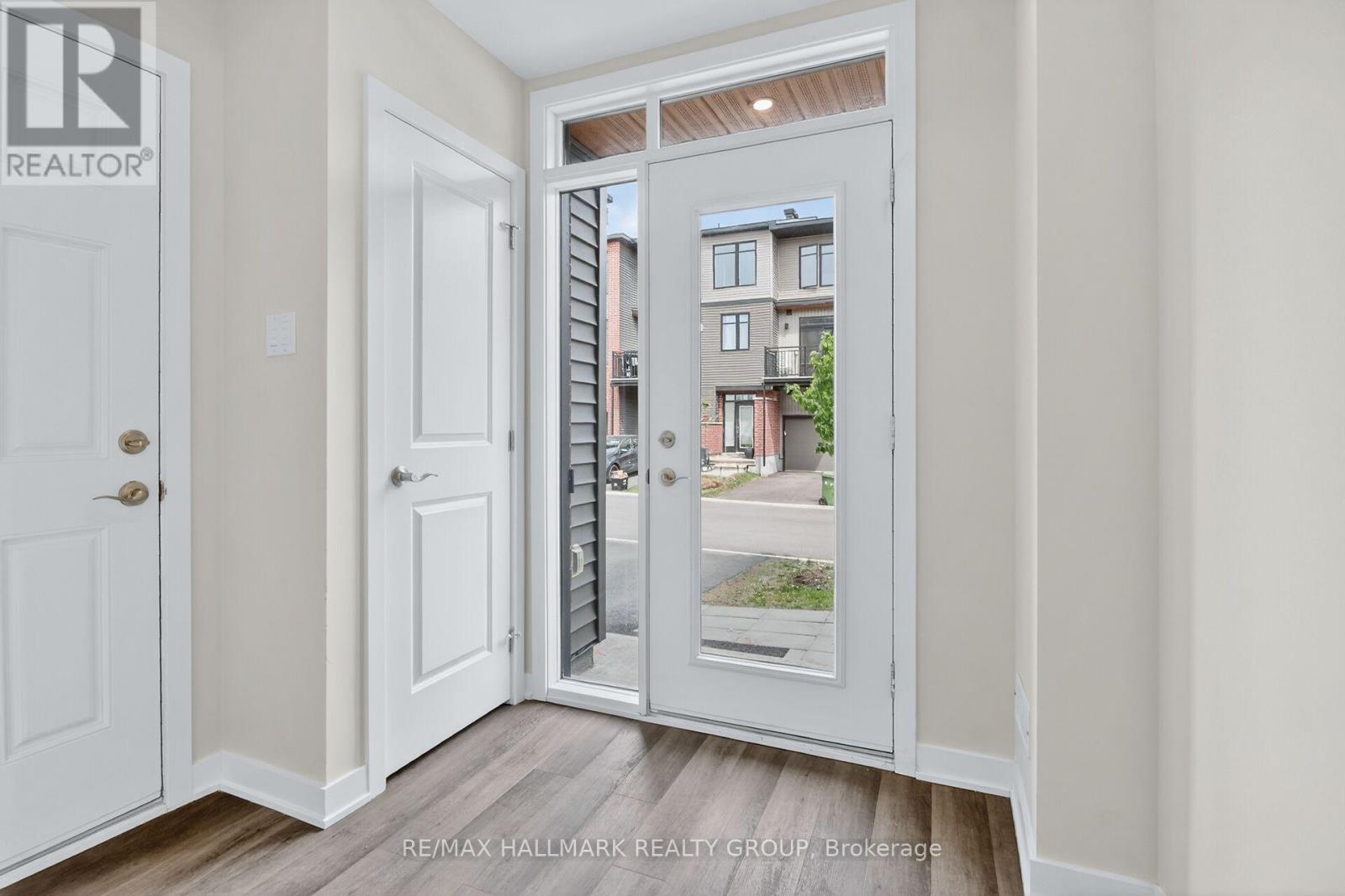 Foyer with closet and inside entry from garage