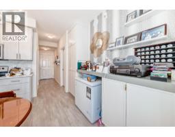 Living room/Dining room - 1118, 298 Sage Meadows Park Nw, Calgary, AB T3P1P5 Photo 7