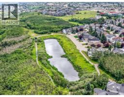 43 Cougar Ridge Bay Sw, Calgary, AB T3H5C4 Photo 30