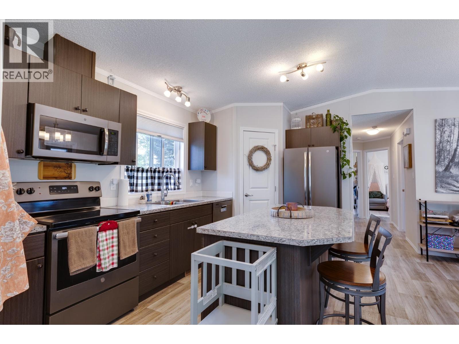 Photo 11 of 38 — 8369 CANTLE DRIVE · Prince George, BC