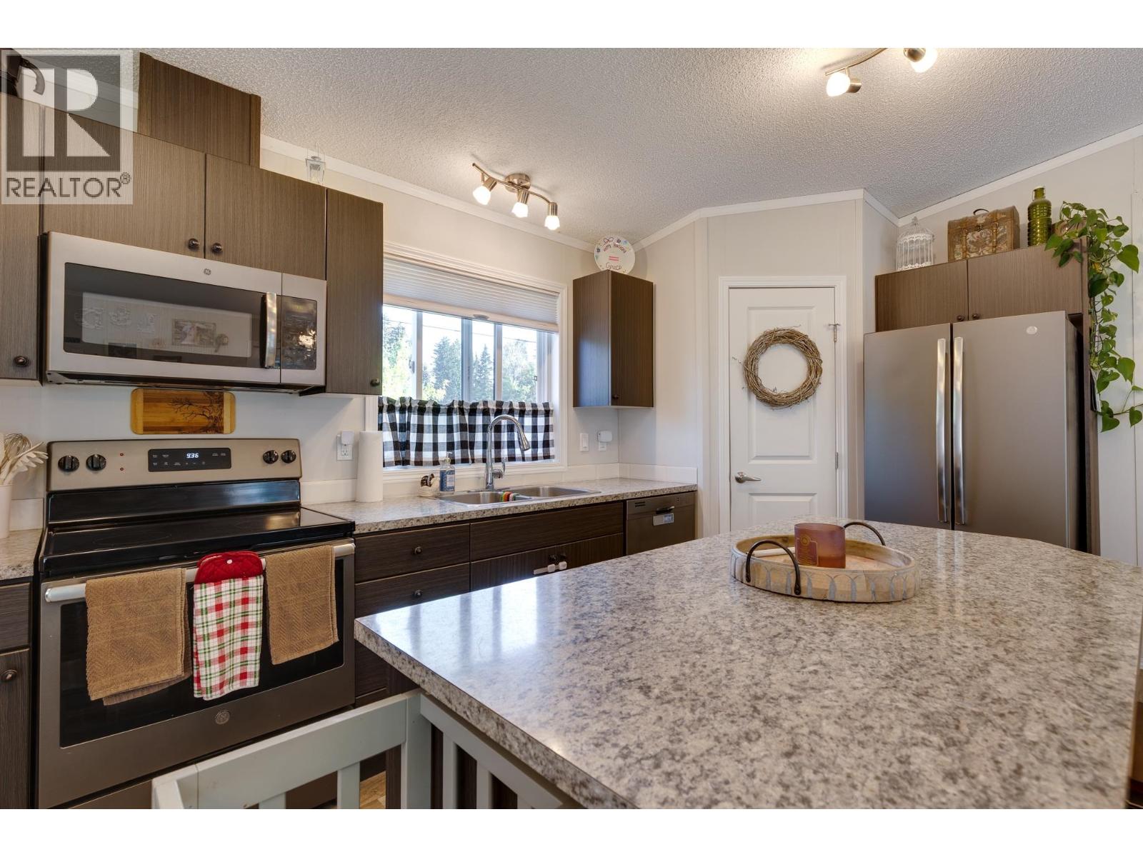 Photo 16 of 38 — 8369 CANTLE DRIVE · Prince George, BC