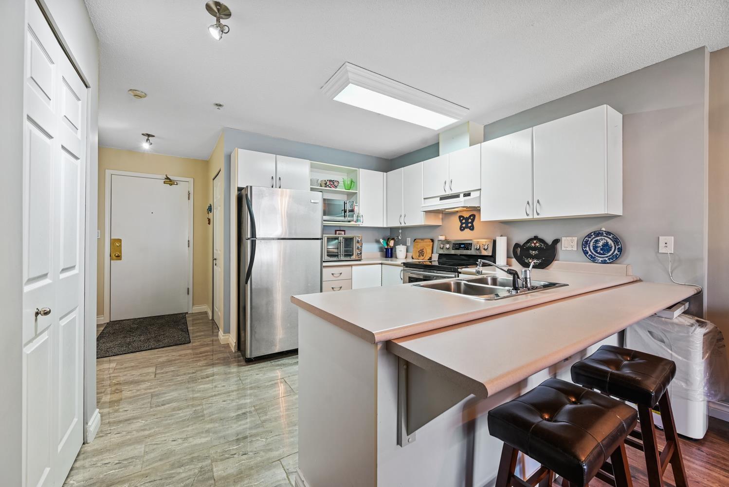 211 12160 80 AVENUE