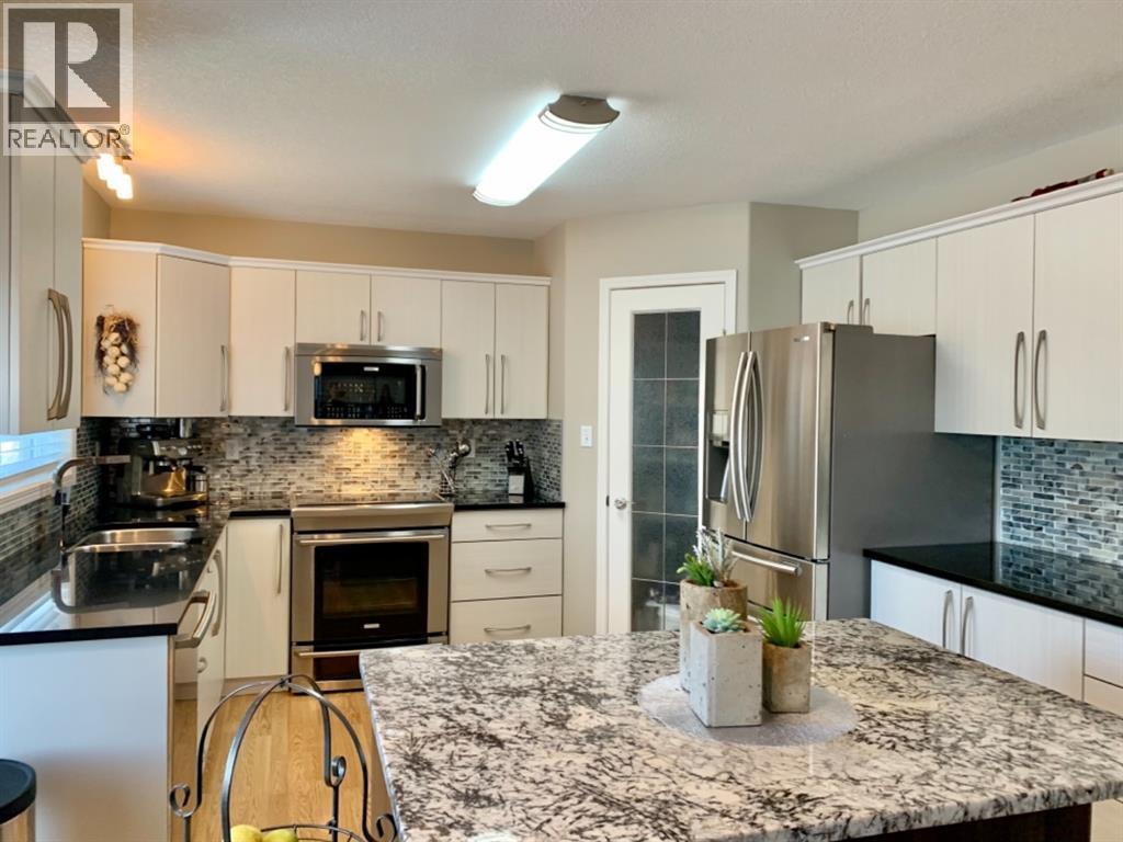 9106 93 Ave - 8