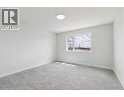 546 Hotchkiss Manor, Calgary, AB T3S0J9 Photo 23