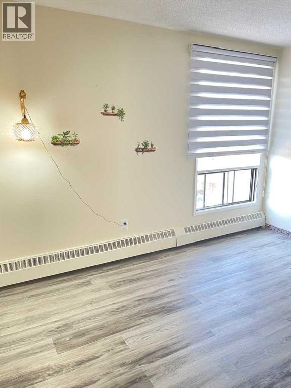 #306 1334 14 Avenue SW - 14
