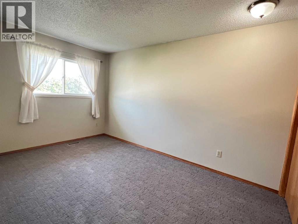 Listing photo – 63 Mclevin Crescent, Red Deer