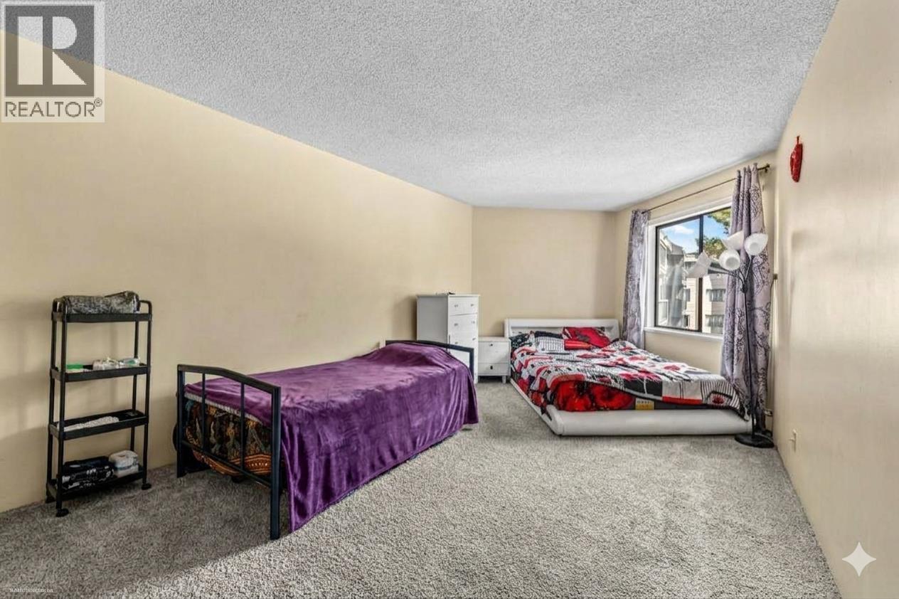 211 8400 LANSDOWNE ROAD, Richmond