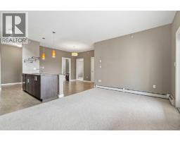 Living room - 441, 11 Millrise Drive Sw, Calgary, AB T2Y0K7 Photo 6