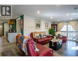 Living Room w/Access to Roofed Verandah