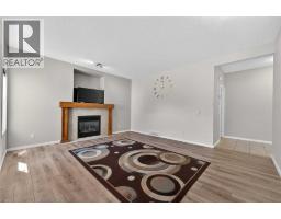 Bedroom - 52 Reunion Close Nw, Airdrie, AB T4B0M2 Photo 10