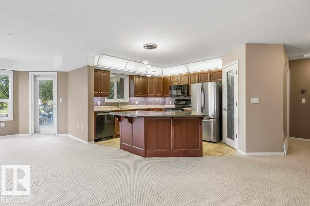 #220 9008 99 AV NW - 9