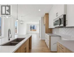 73 Southborough Square, Cochrane, AB T4C3J7 Photo 10