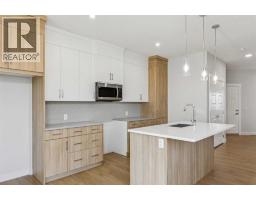 73 Southborough Square, Cochrane, AB T4C3J7 Photo 11