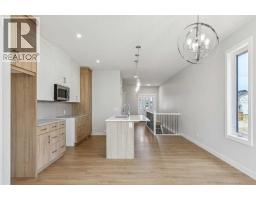 73 Southborough Square, Cochrane, AB T4C3J7 Photo 16