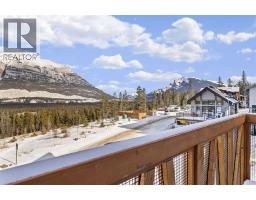 Bedroom - 202k, 209 Stewart Creek Rise, Canmore, AB T1W0N9 Photo 7