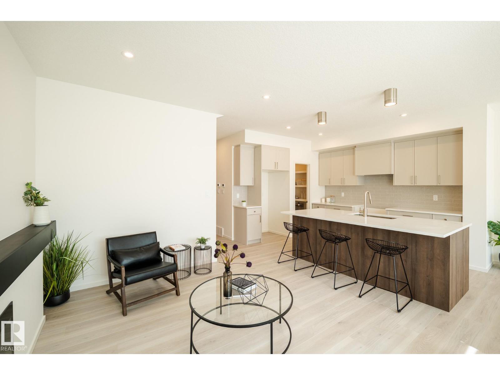 7705 174A AV NW - 9