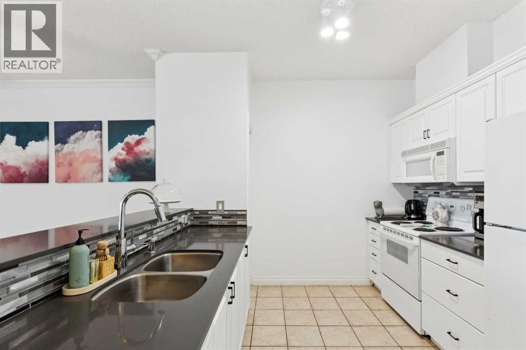 #2126 1010 Arbour Lake Road NW - Image 5