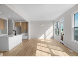 Bedroom 2 - 7103 50a Av, Beaumont, AB T4X3E5 Photo 6