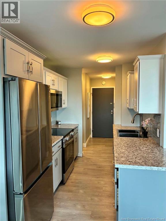 #709 310 Woodward Avenue - Image 9
