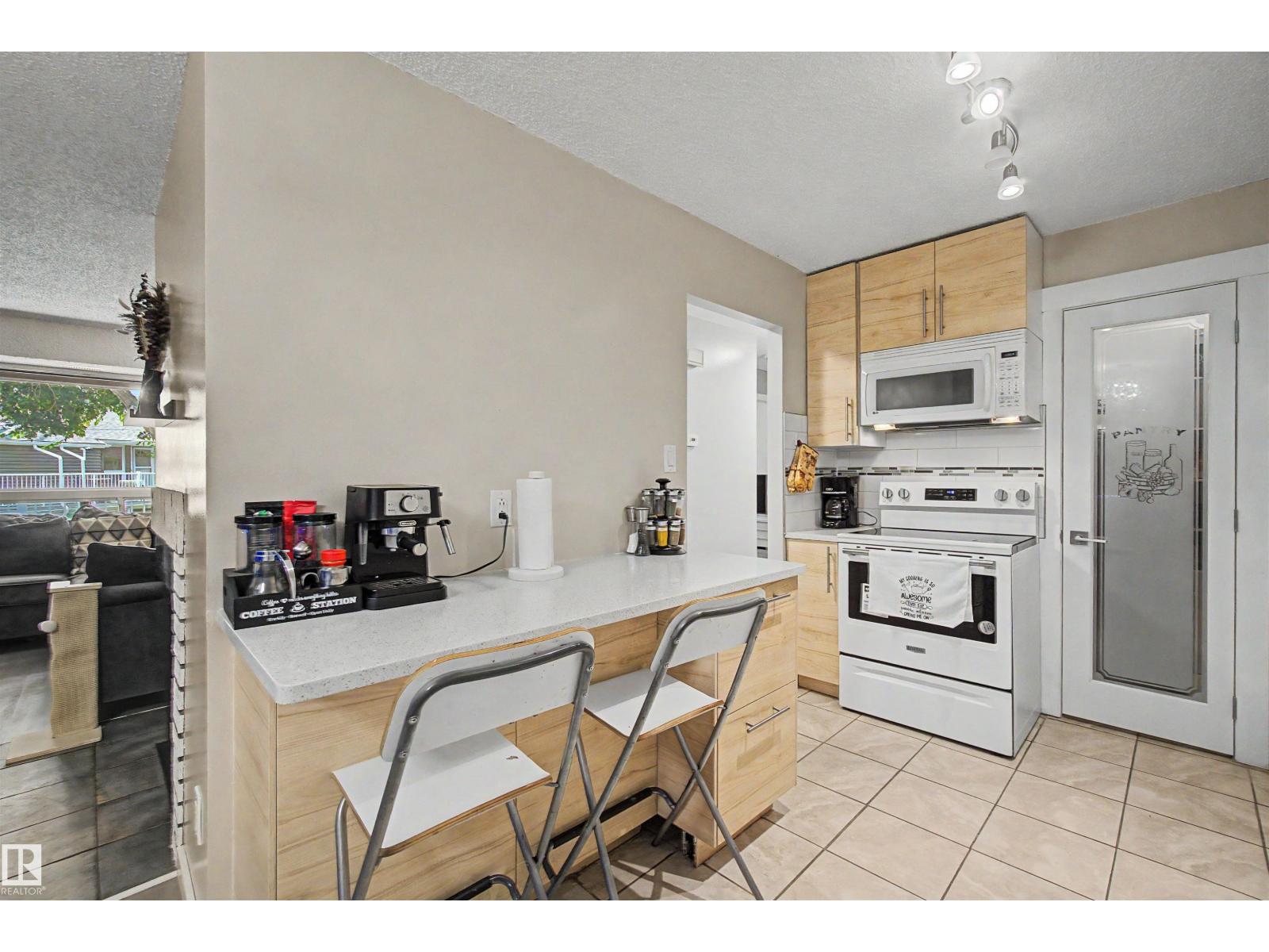 #39 3111 142 Av NW photo 4 — MLS® E4501927