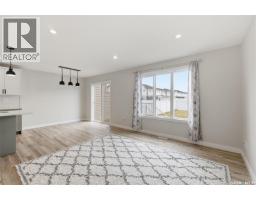 Living room - 713 Brighton Boulevard, Saskatoon, SK S7V1P3 Photo 12
