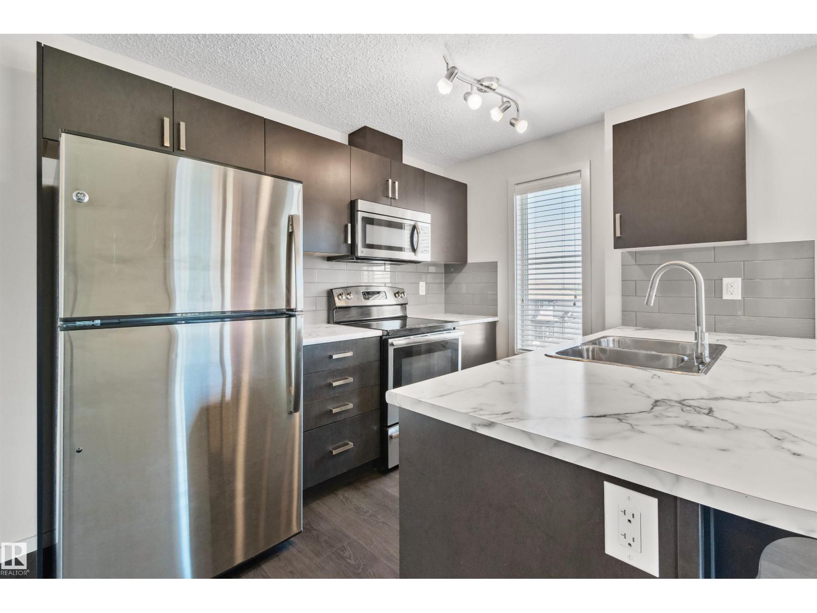 #318 5521 7 AV SW - 12