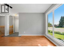 Living room - 125 Carr Place, Okotoks, AB T1S1E2 Photo 6
