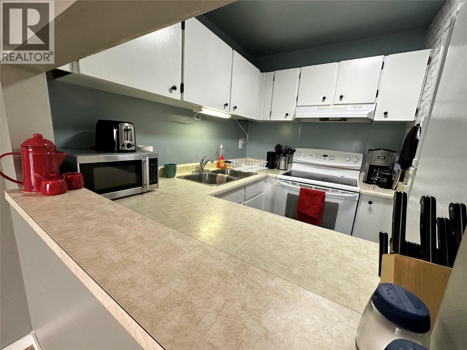185 CHAMBERLAIN Crescent Unit# 302, Tumbler Ridge