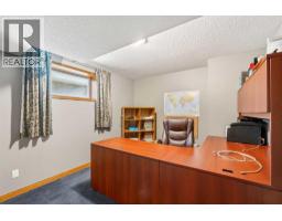 215 Rocky Ridge Drive Nw, Calgary, AB T3G4M1 Photo 29