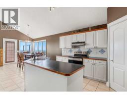 Kitchen - 215 Rocky Ridge Drive Nw, Calgary, AB T3G4M1 Photo 6