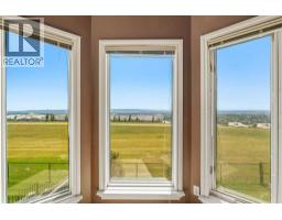 215 Rocky Ridge Drive Nw, Calgary, AB T3G4M1 Photo 21