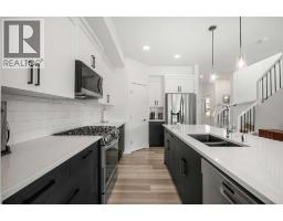 256 Heritage Heights, Cochrane, AB T4C3A7 Photo 11