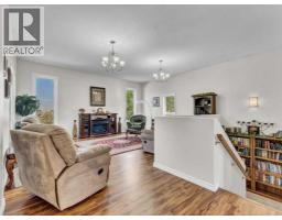 Family room - 7, 11418 Eagle Butte Road, Rural Cypress County, AB T1B0H9 Photo 11