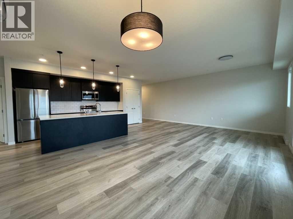 2304, 42 Cranbrook Gardens SE, Cranston, Calgary photo 5