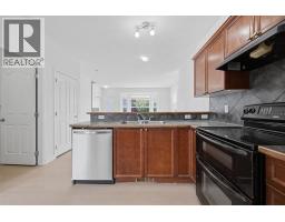 Living room - 904, 2066 Luxstone Boulevard Sw, Airdrie, AB T4B0L1 Photo 9